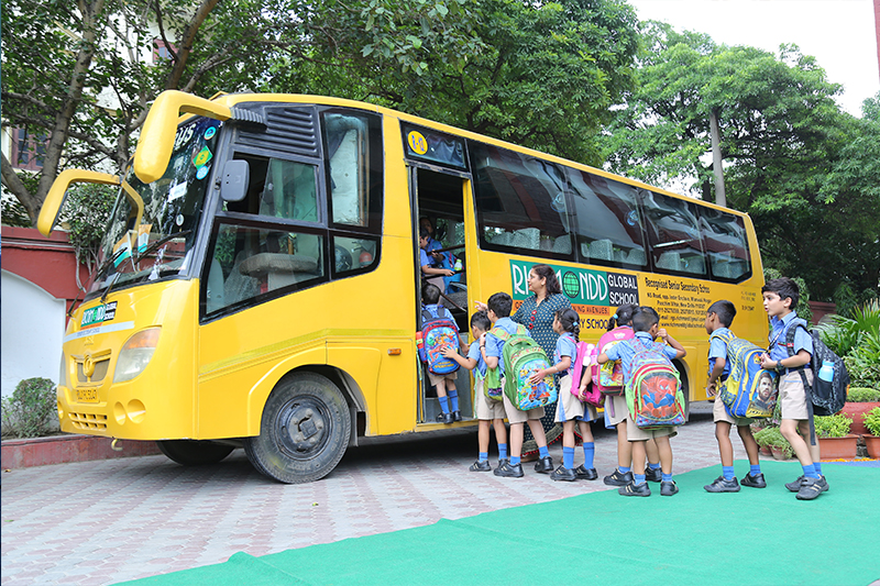Students taking Richmondd Global School Bus in Delhi